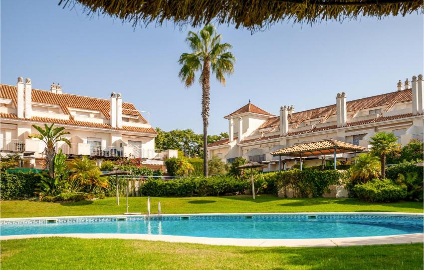 Nice home in Nuevo Portil with Outdoor swimming pool and 3 Bedrooms