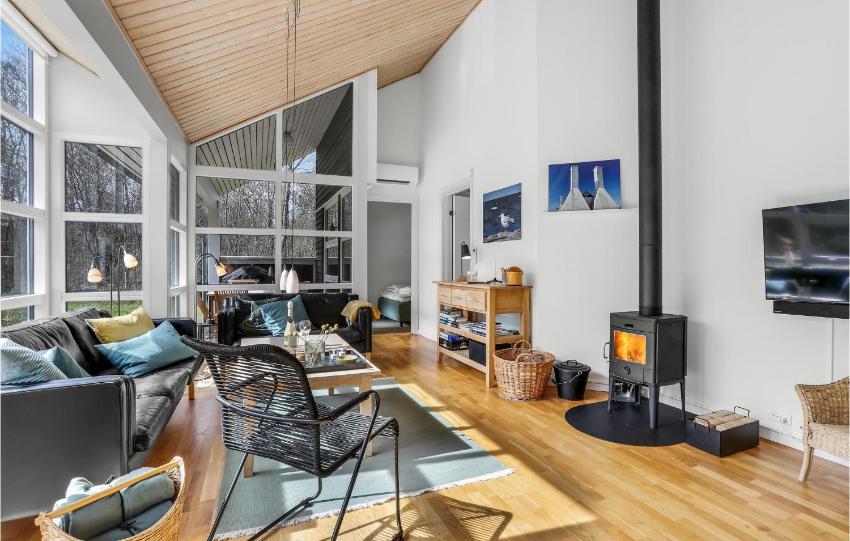 Amazing home in Hasle with WiFi, 4 Bedrooms and Sauna