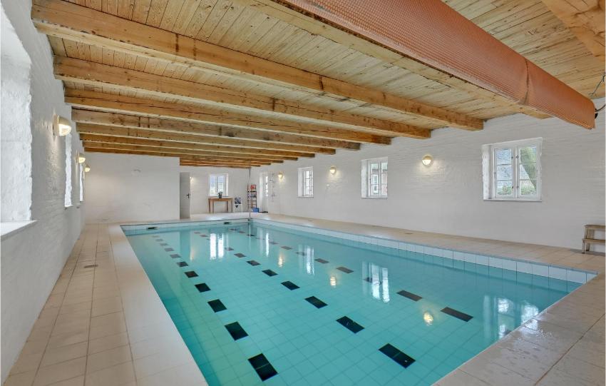 Beautiful home in Bredebro with Sauna, 9 Bedrooms and WiFi
