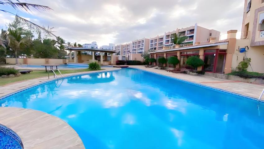 SHANZU BEACHFRONT FURNISHED APARTMENTS IN MOMBASA - SeaView, Private Jacuzzi, Bathtub, Swimming Pool, Extra Beds, Luxury Swing beds, Open Kitchen, AC, Wi-Fi & DSTV