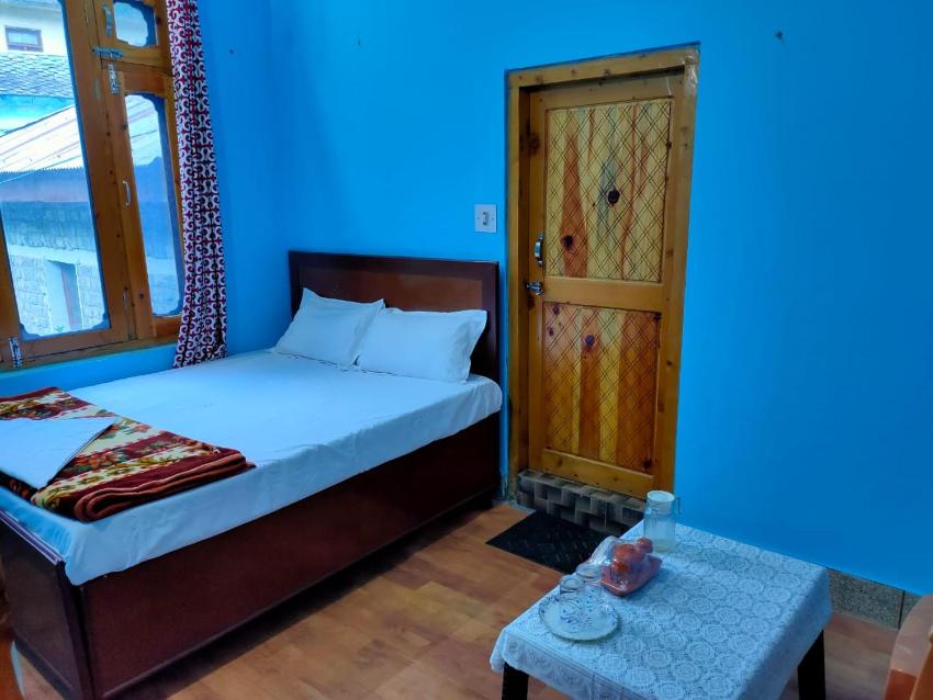 Tirthan river front farm stay