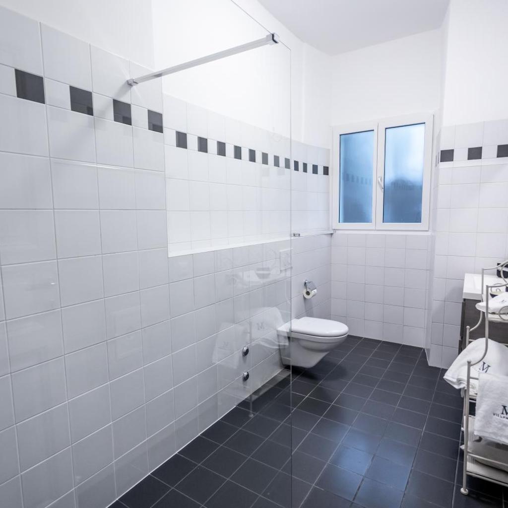 VILLA MURALTO Boutique Hotel Rooms and Garden – Bild