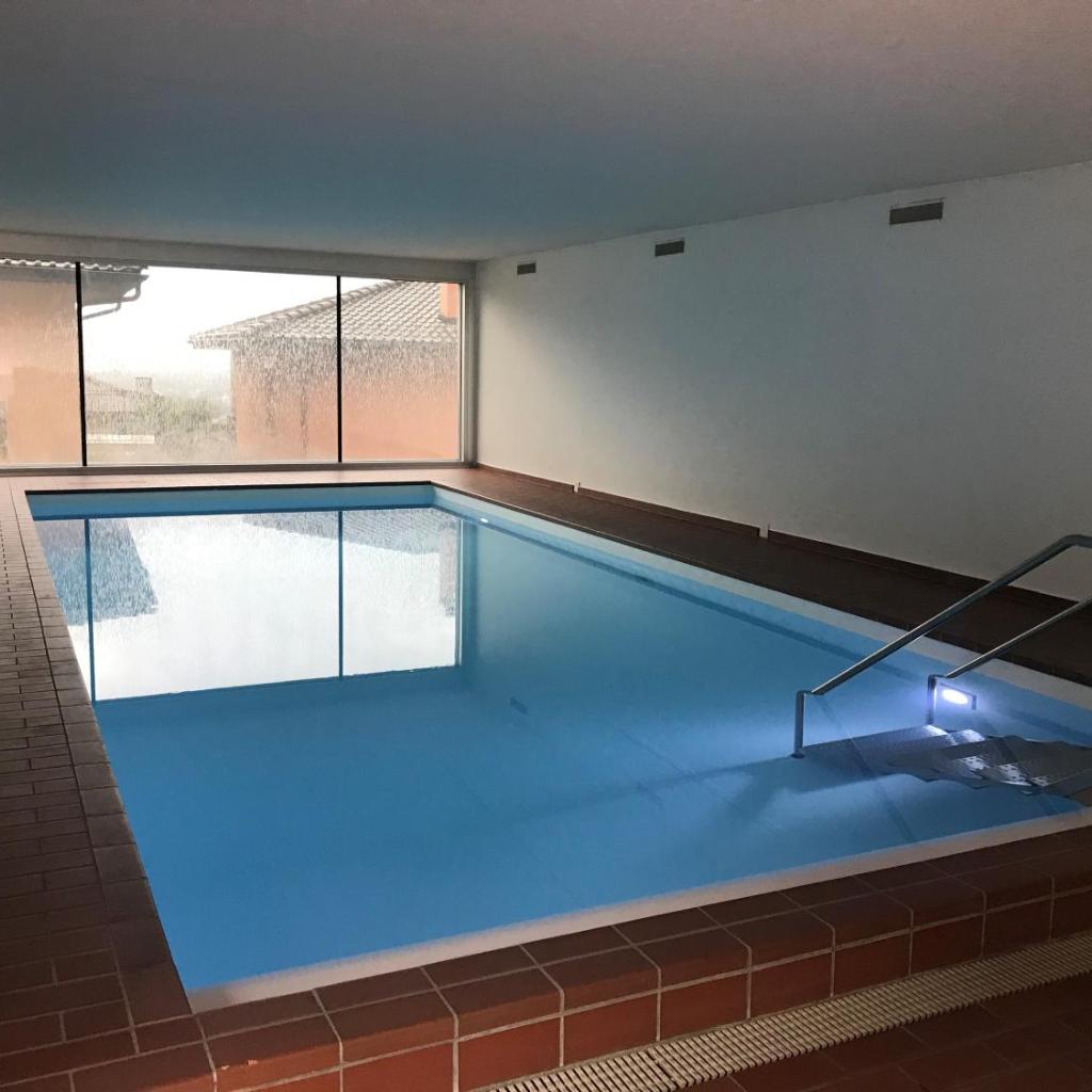 Image 1 - Lichtdurchflutete Ferienwohnung mit Panorama-Sicht und Schwimmbad/Sauna