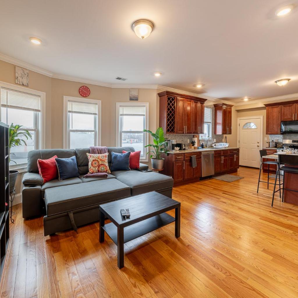 Photograph of Vibrant 4BR Boston Apt - Balcony, Bathtub, TV near I-95 & Pet Friendly 903