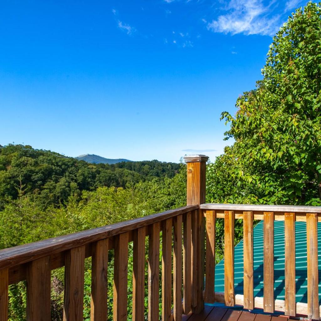 Photograph of Pet-friendly Rustic Cabin with Game Room and Deck