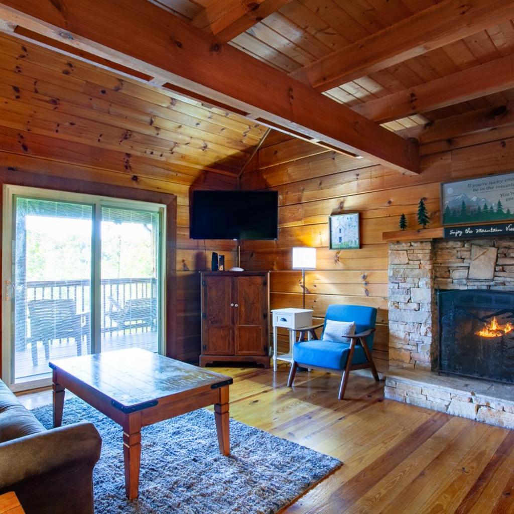 Photograph of Pet-friendly Rustic Cabin with Game Room and Deck