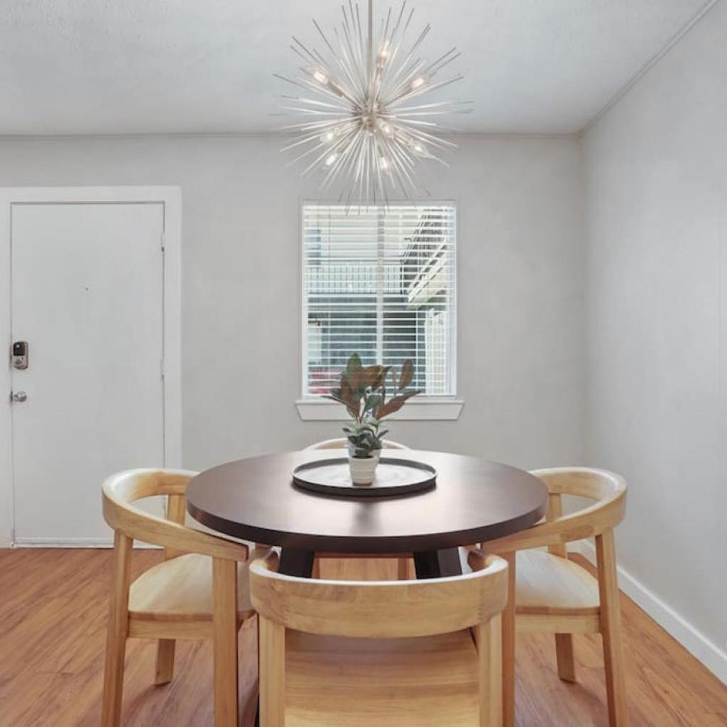Photograph of Cook and Gather Around in a Fully Equipped Apartment