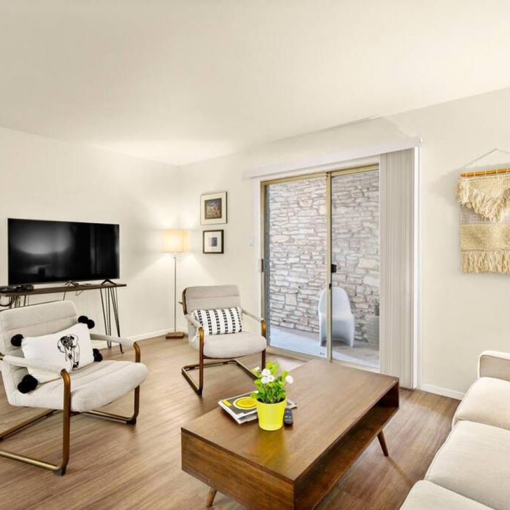 Photograph of Walk to the Golf Course 2BD Apt, Pool, and Parking