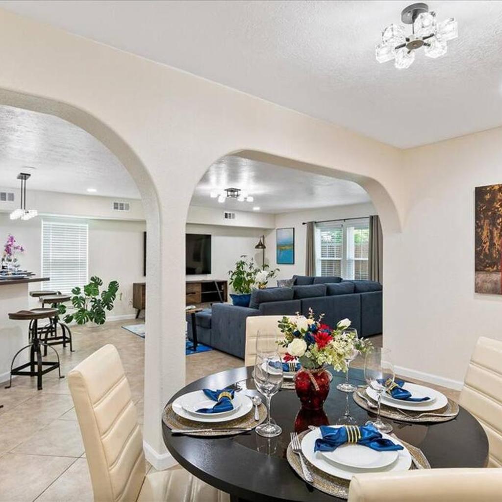 Photograph of Bring the Crew! 4BR Luxe Pad, Backyard Magic & City at Your Door