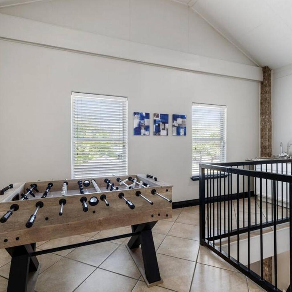 Photograph of Stylish 3 Bedroom With Tons of Games and 85 Inch TV