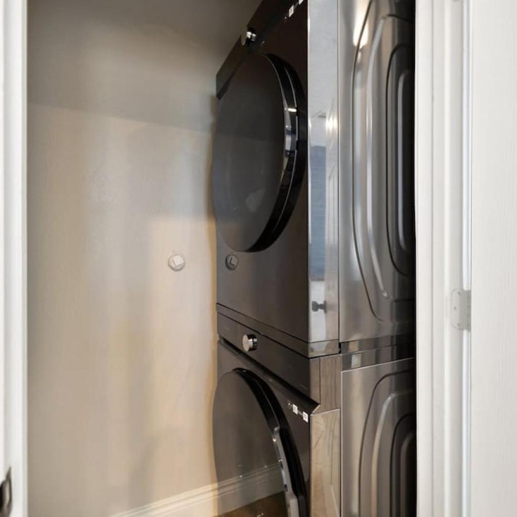 Photograph of Modern 3 Bedroom with 85 Inch TV