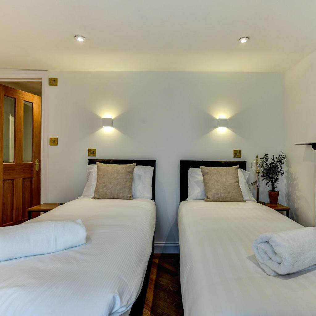 Photograph of Spacious Brighton Retreat 2 Ensuites Weekly and Monthly Stays Marine LGF by Bluehouse Shortlets