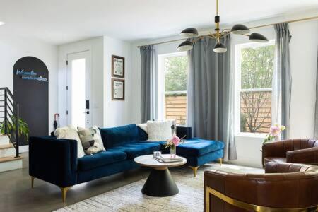 Photograph of 6 Bed with En Suite Baths, Host Up to 20, Rooftops, Parking, Gourmet Kitchens, Cozy Living Spaces, Skyline Views & Fire Table, Near Downtown, Distilleries & Marathon Village, High-Speed Wi-Fi, 24hr Hospitality