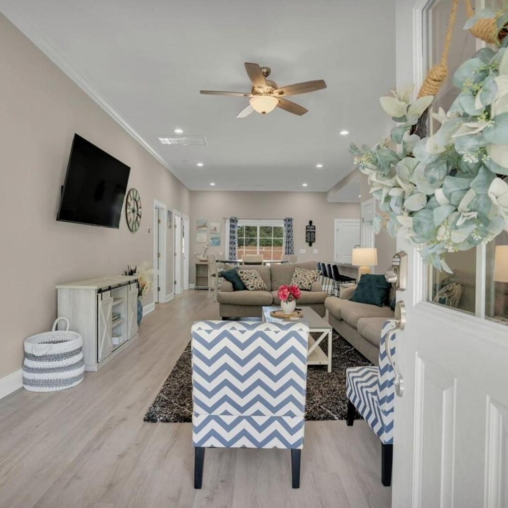 Photograph of Charming Beach House Short Walk To Beach