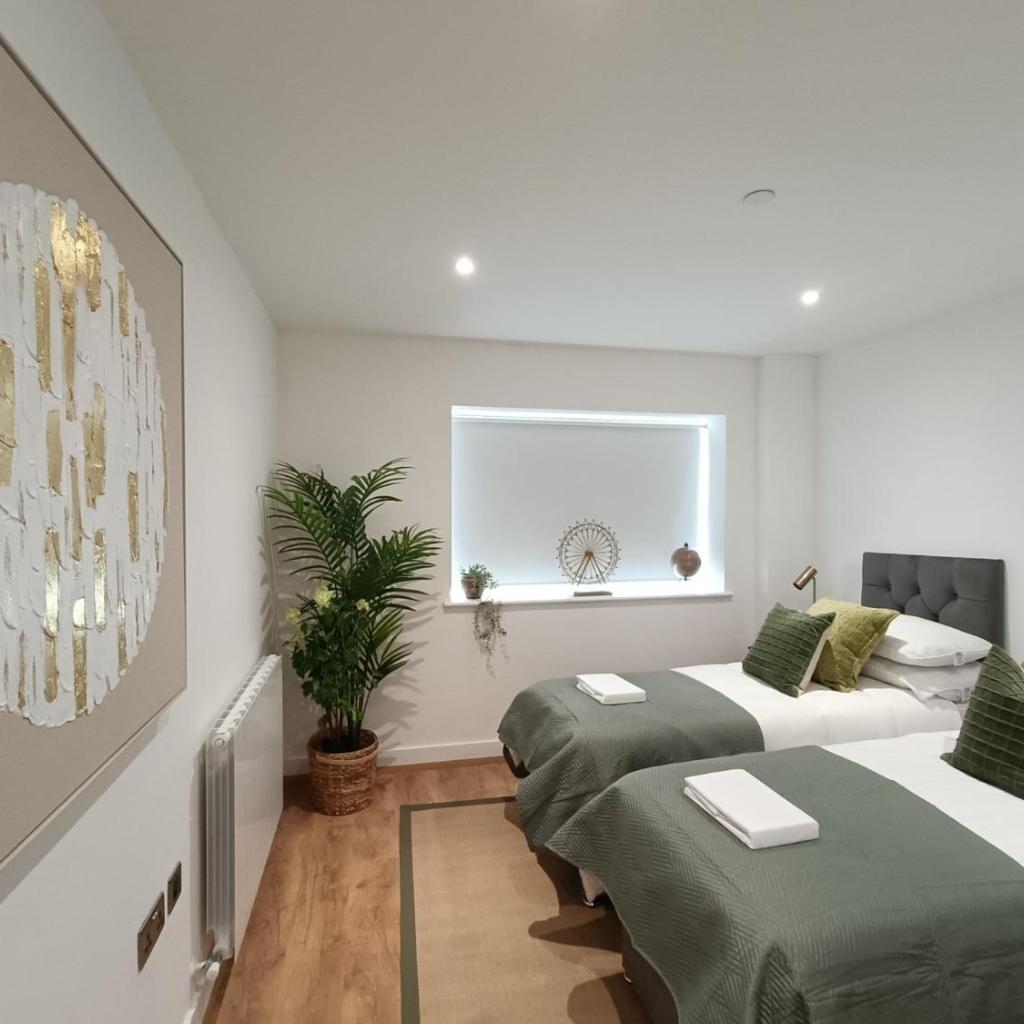 Photograph of Snuggle Inn - Riverside Apartments - Views Over looking London River Thames, Close to O2 Arena, London Excel, London City Airport, Thames Clipper- River Boat Service, Woolwich Ferry, Onsite parking, TWIN ROOM OPTION available