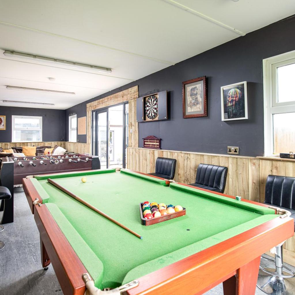 Photograph of The Pine Cabins including Games Room, Camp fire & Hot tub