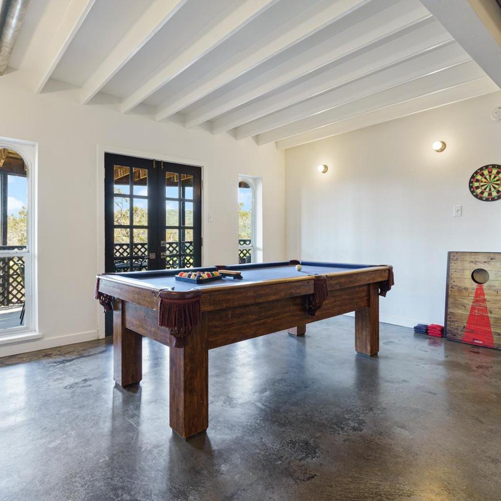 Photograph of Sunset Waterfront 4BR 2BA w Pool and River Near Lake Travis by Austin Vacay