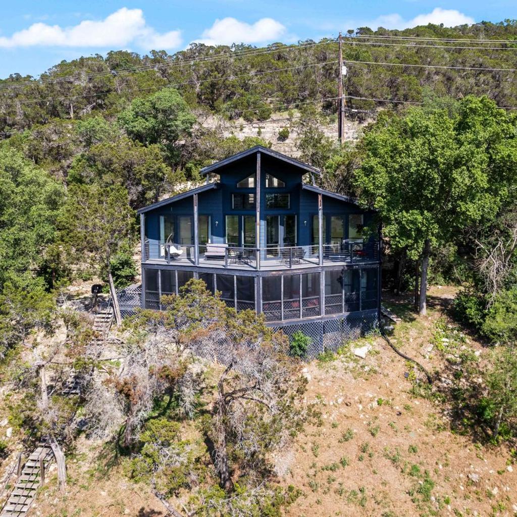 Photograph of Sunset Waterfront 4BR 2BA w Pool and River Near Lake Travis by Austin Vacay