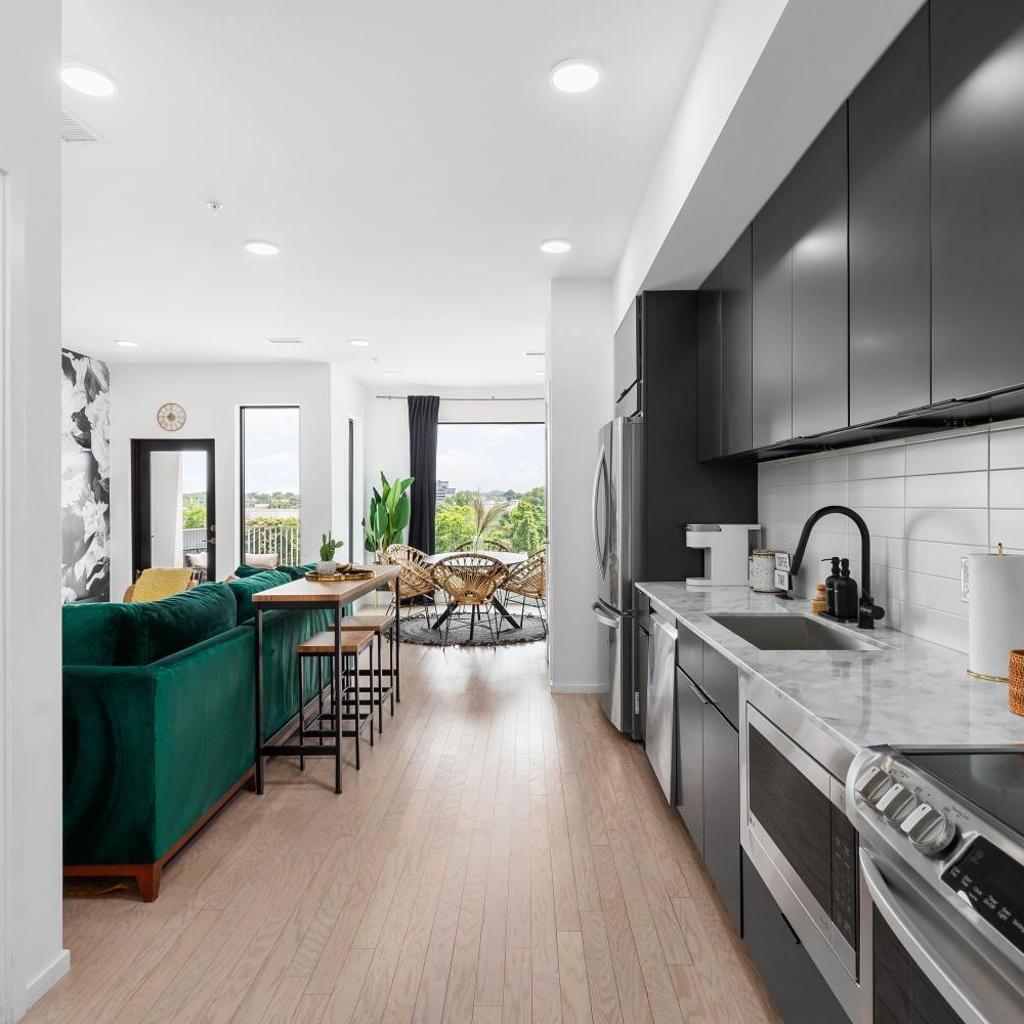 Photograph of River View High-End Condo with Private Patio and FREE Parking