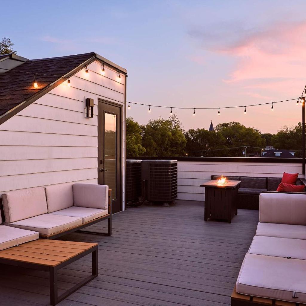 Photograph of 6 Bed with En Suite Baths, Host Up to 20, Rooftops, Parking, Gourmet Kitchens, Cozy Living Spaces, Skyline Views & Fire Table, Near Downtown, Distilleries & Marathon Village, High-Speed Wi-Fi, 24hr Hospitality