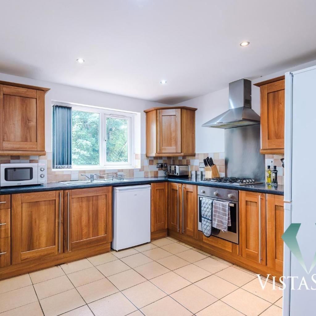 Photograph of Large 5BDR House By Vista Stays Short Lets & Serviced Accommodation Salford With Pool Table, PS4 & Private Parking