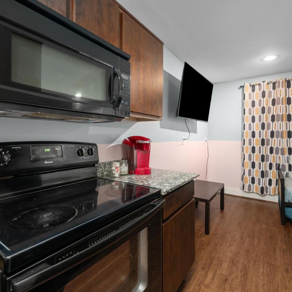 Photograph of Chic & Cozy 1BR Apt with Free Parking & King Bed