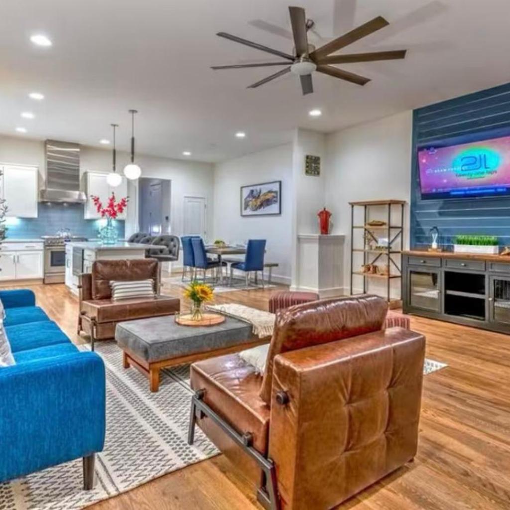 Photograph of New 4BDRM House with City views, Pool Table, 5min to Downtown! Sleeps 22!