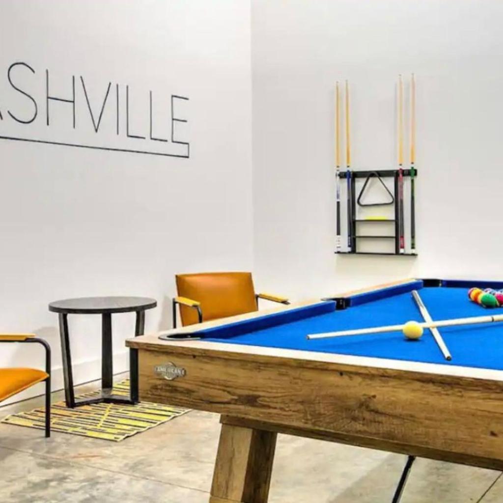 Photograph of New 4BDRM House with City views, Pool Table, 5min to Downtown! Sleeps 22!