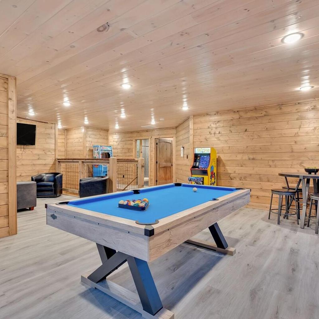Photograph of Honeybear Hideaways - Luxury Cozy Cabin with Theater, Game Room and Hot Tub