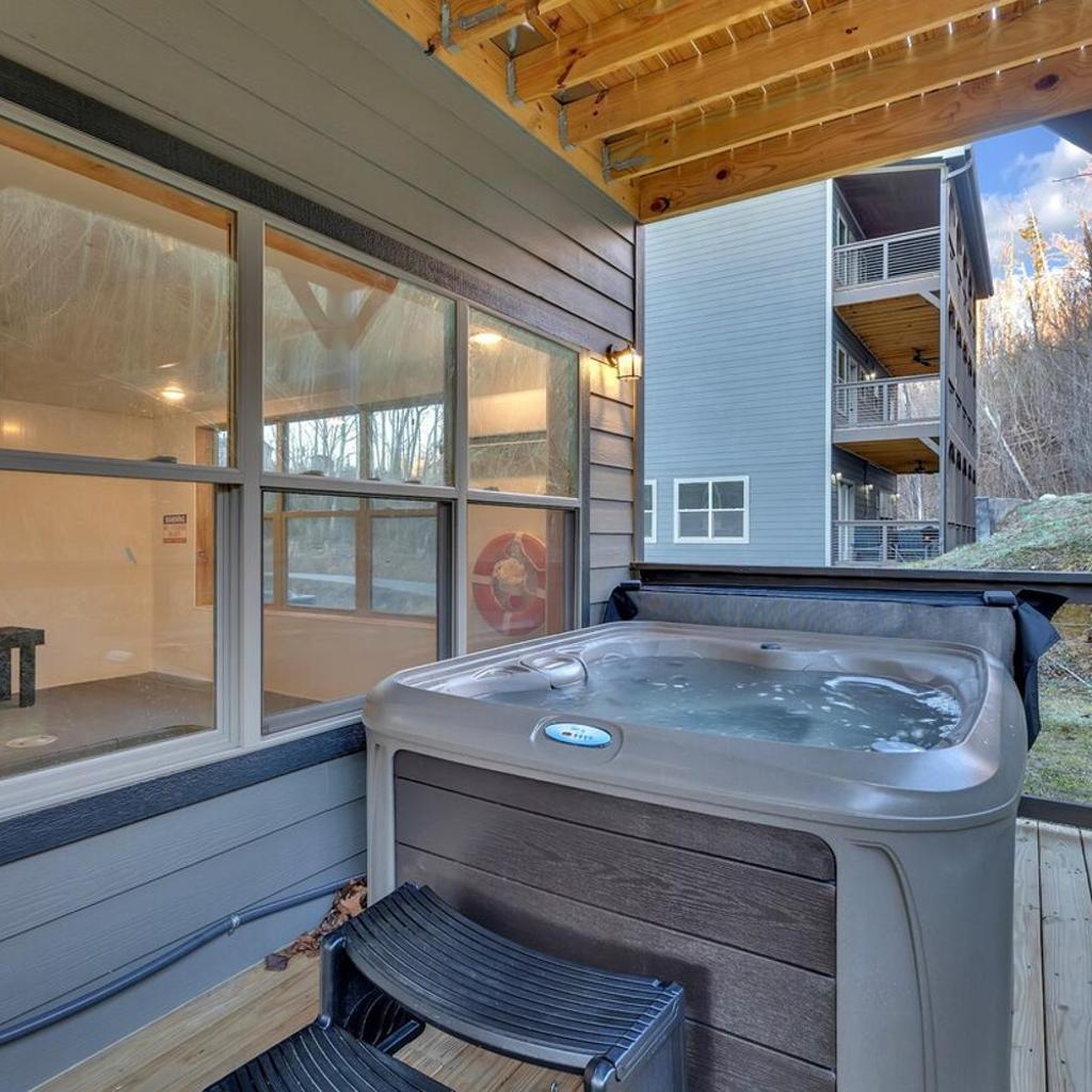 Photograph of Honeybear Hideaways - New Bear-Themed Cabin Cozy and Family Friendly Retreat with Indoor Pool, Game Room, Bear Room and Hot Tub