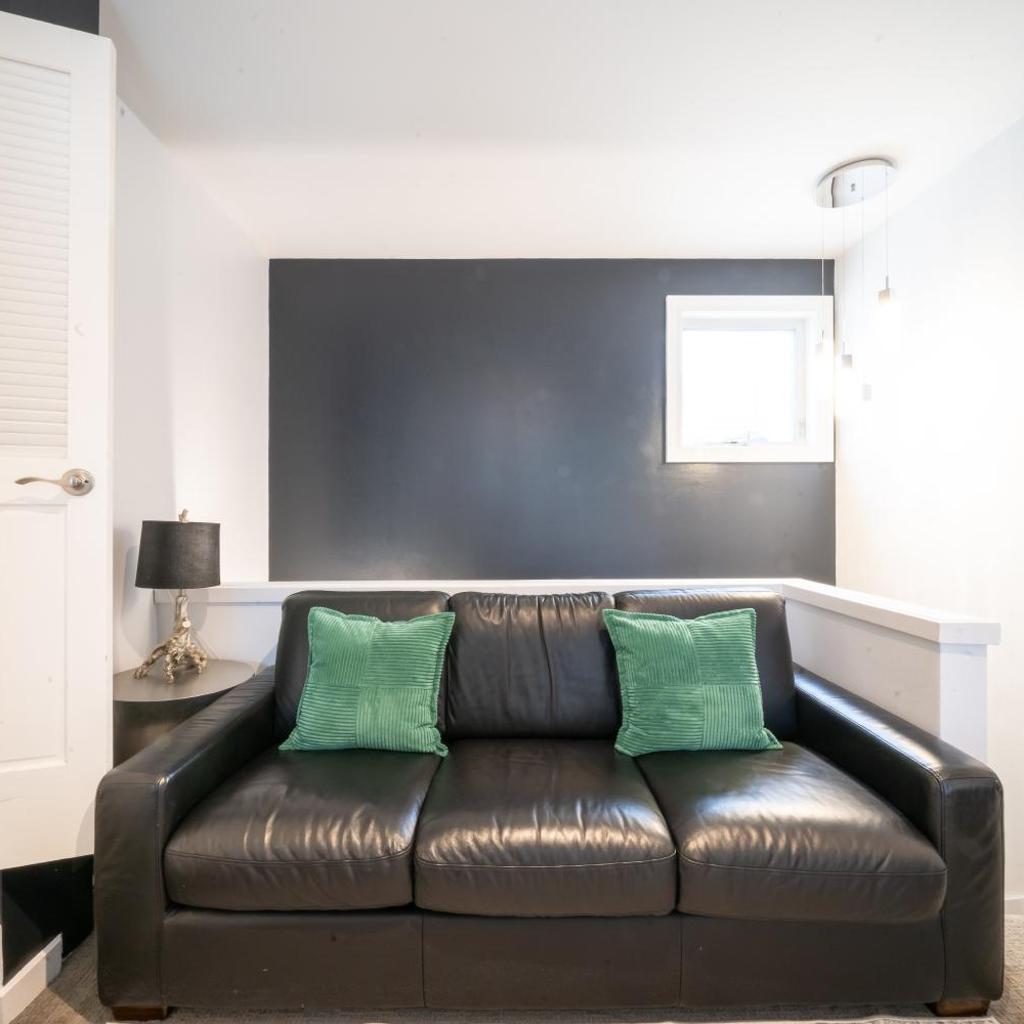 Photograph of Modern Downtown Top Floor Penthouse With Bay Views