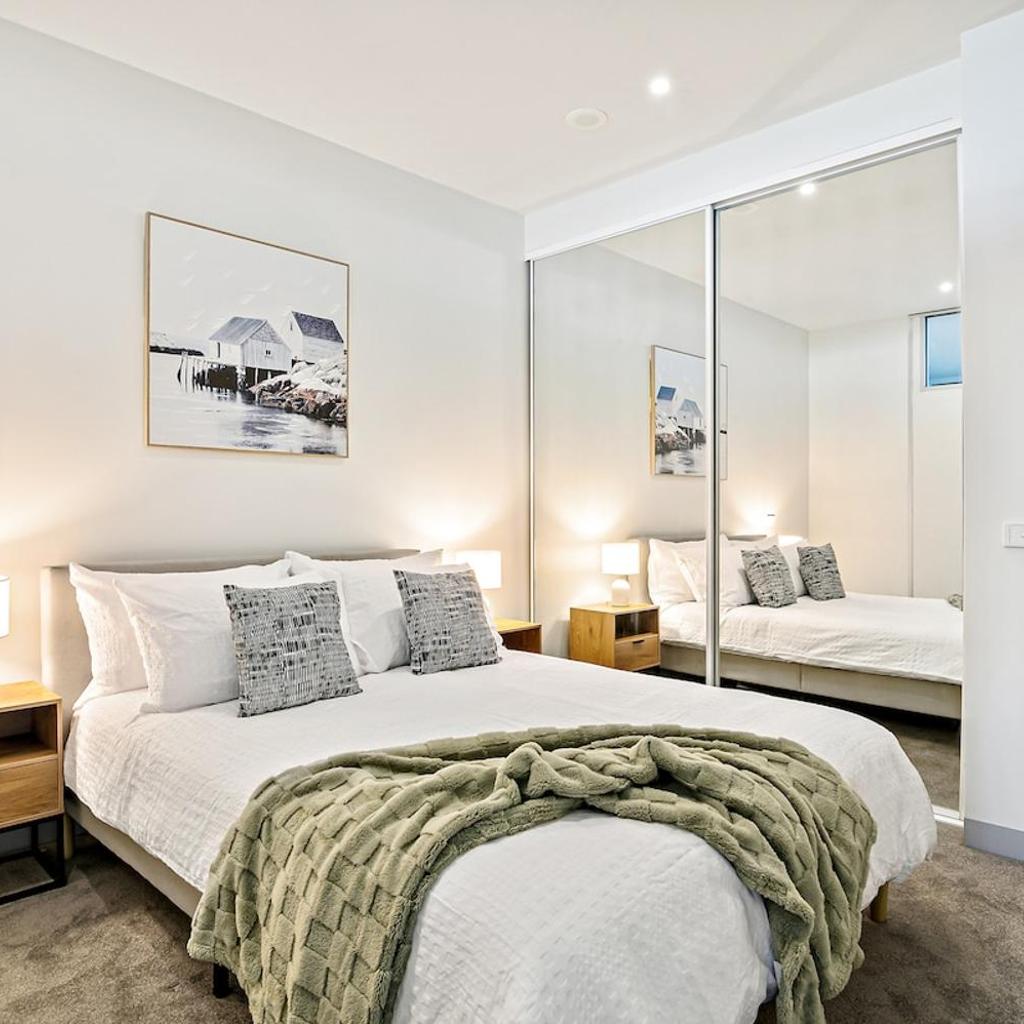 Photograph of Modern 2B2B Apt near Crown with Parking and City Views