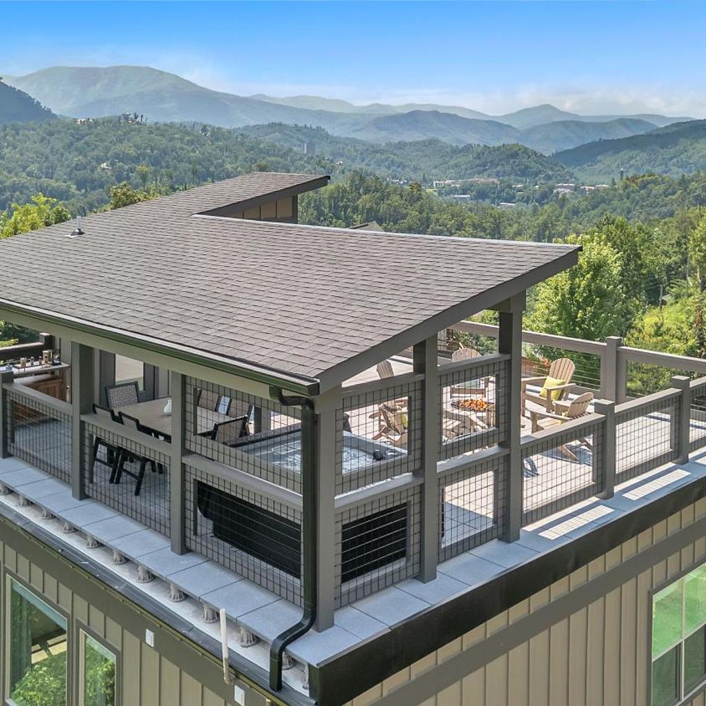 Photograph of Family Chalet With Rooftop Theater GameRoom Mins to DT