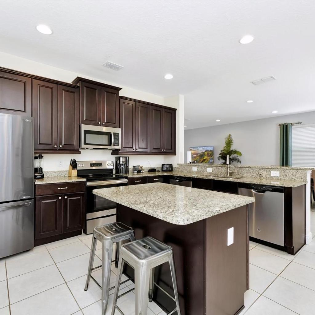 Photograph of Vibrant Home Near Disney With Private Pool, Game Room And Waterpark & Resort Access At Encore Resorts Reunion - 7572Mr