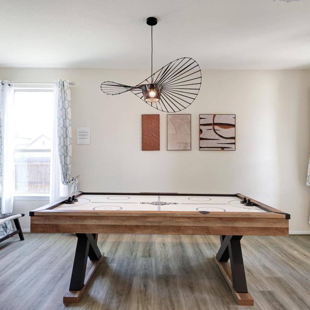 Photograph of Hot Tub Retreat Games BBQ Air Hockey Swing Set