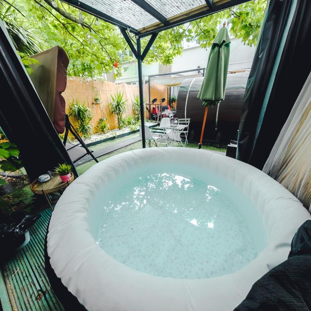 Photograph of TranquilHaus! 3BR Retreat with Spa Saunas, Hot Tub & Garden Cinema