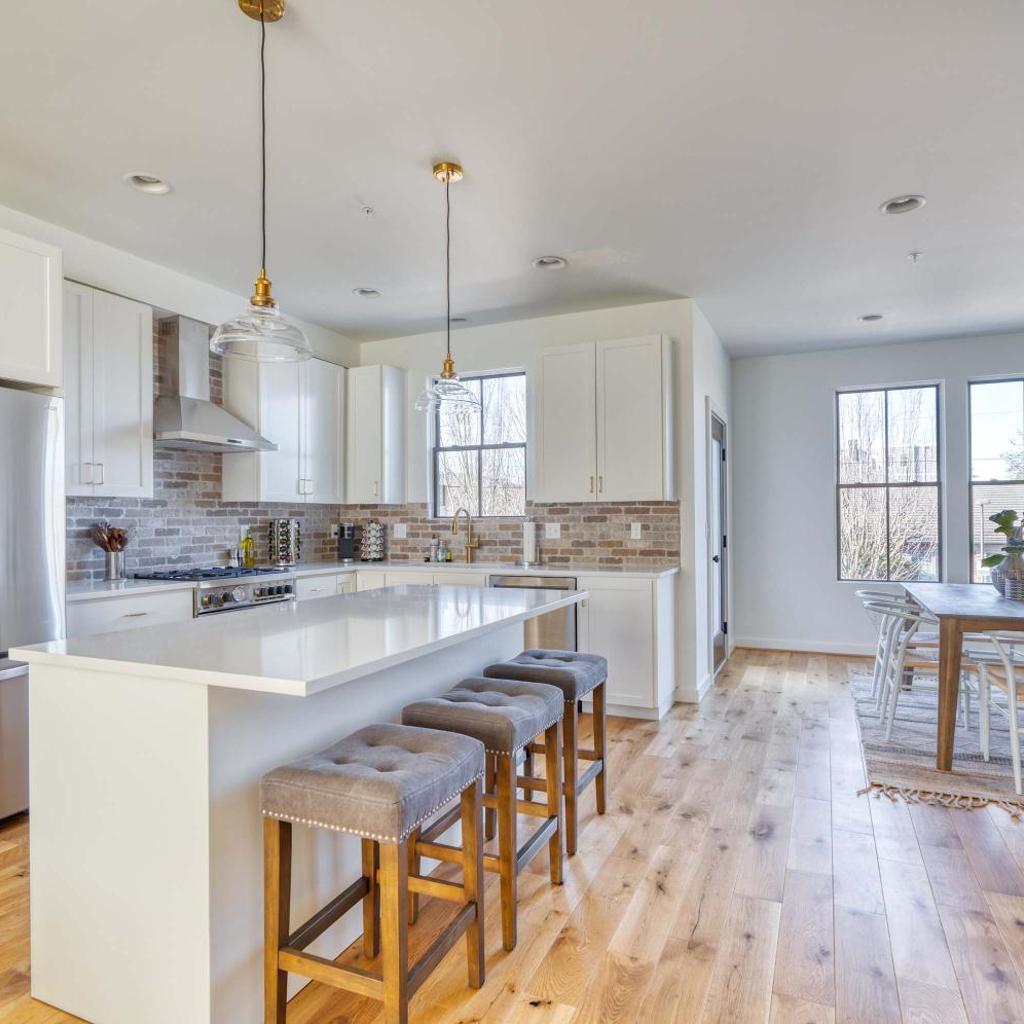 Photograph of Stay Portland - Custom North Tabor Farmhouse - Gym & Kitchen