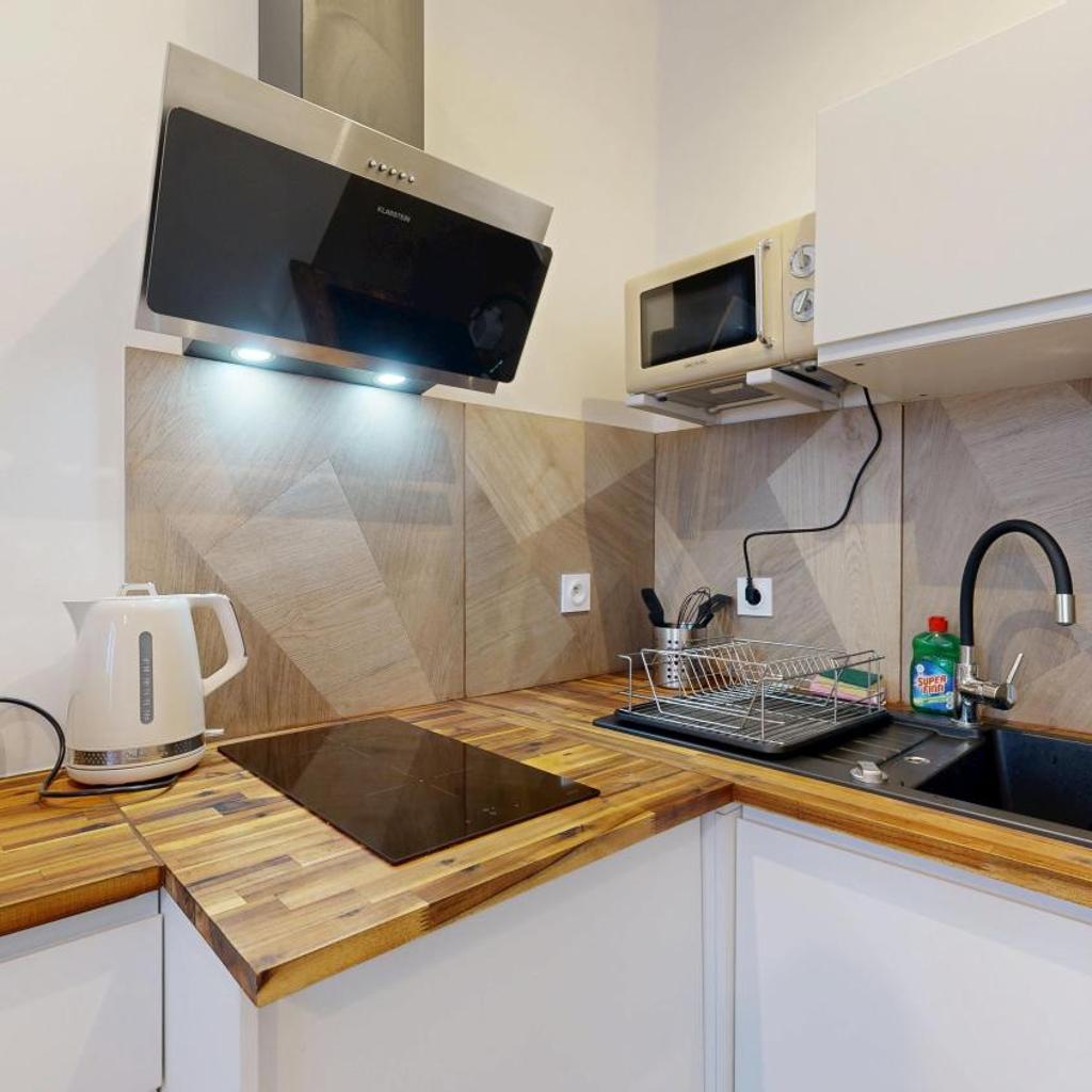 Photograph of Le Cyrano by expat renting - Hyper centre - Wifi