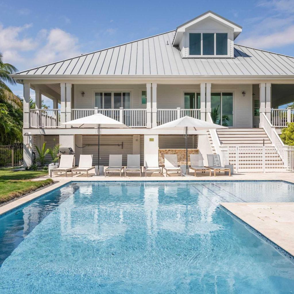Photograph of Suncoast House -Pool & Boat Dock