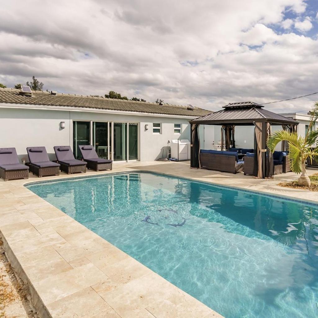 Photograph of 4 BR home with private pool
