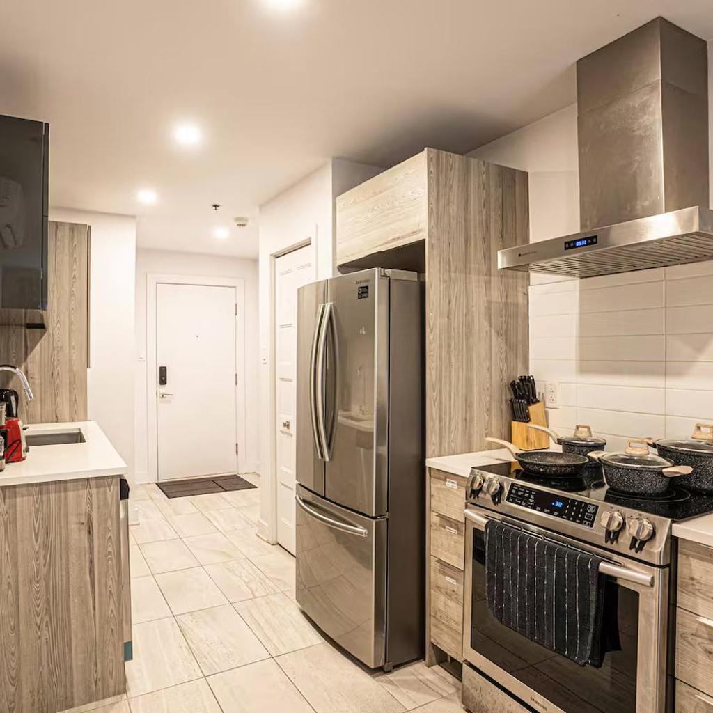 Photograph of Sleek Modern 2BR Getaway with Gym & Rooftop Views Near Downtown & Airport