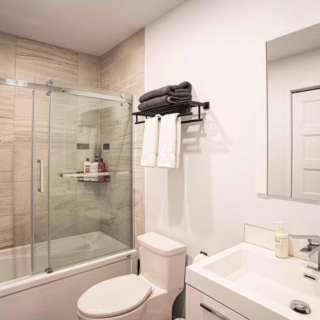 Photograph of Sleek Modern 2BR Getaway with Gym & Rooftop Views Near Downtown & Airport