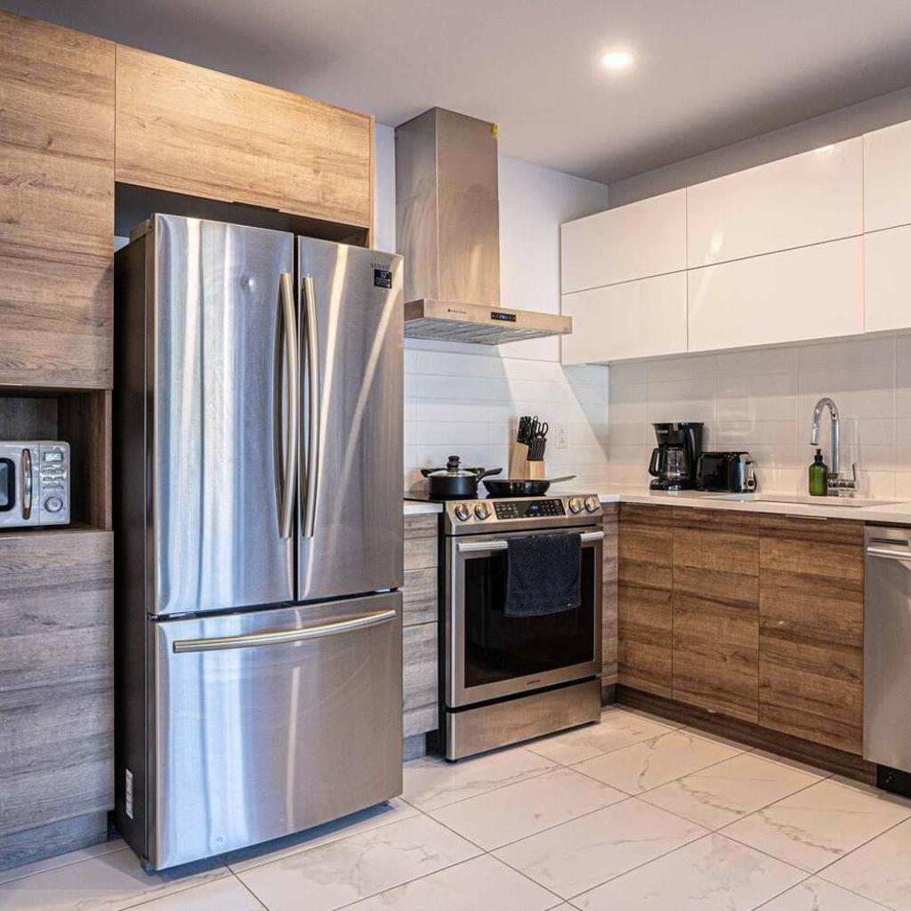 Photograph of Spacious 2 King Suite with Parking & Gym Near Downtown & Airport