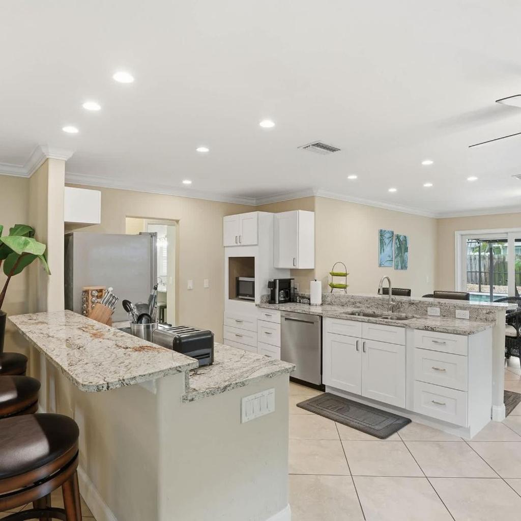Photograph of Coastal Naples Getaway with Heated Pool