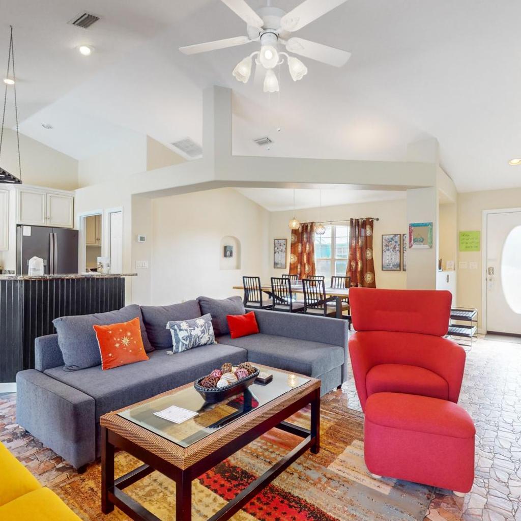 Photograph of Cheerful home with private pool close to the beach & downtown