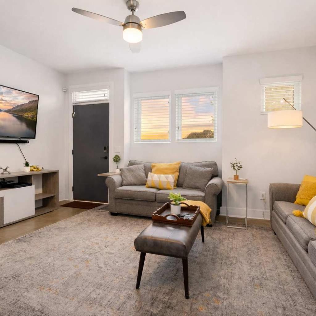 Photograph of Modern 3-Story Townhome w Rooftop & City Views