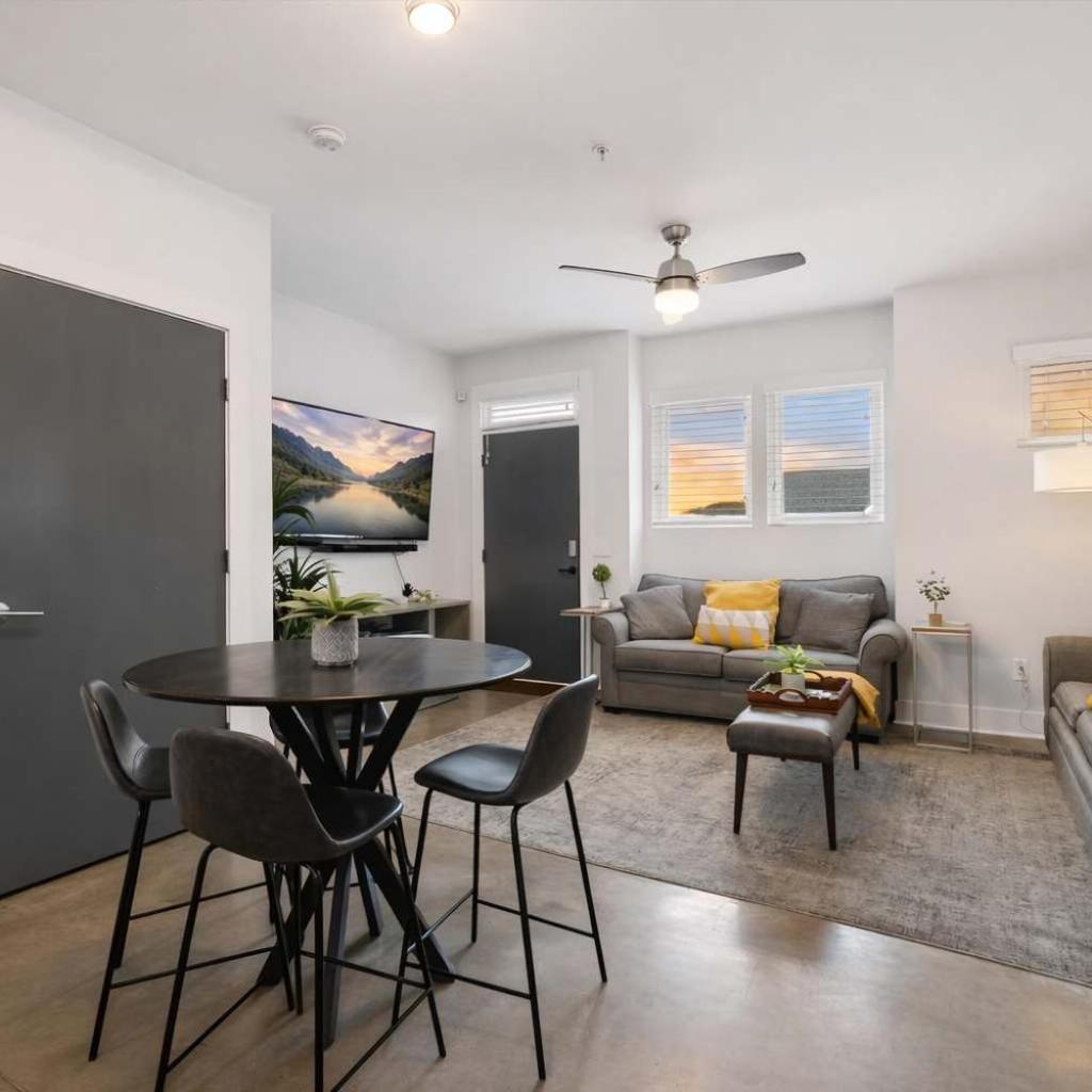 Photograph of Modern 3-Story Townhome w Rooftop & City Views