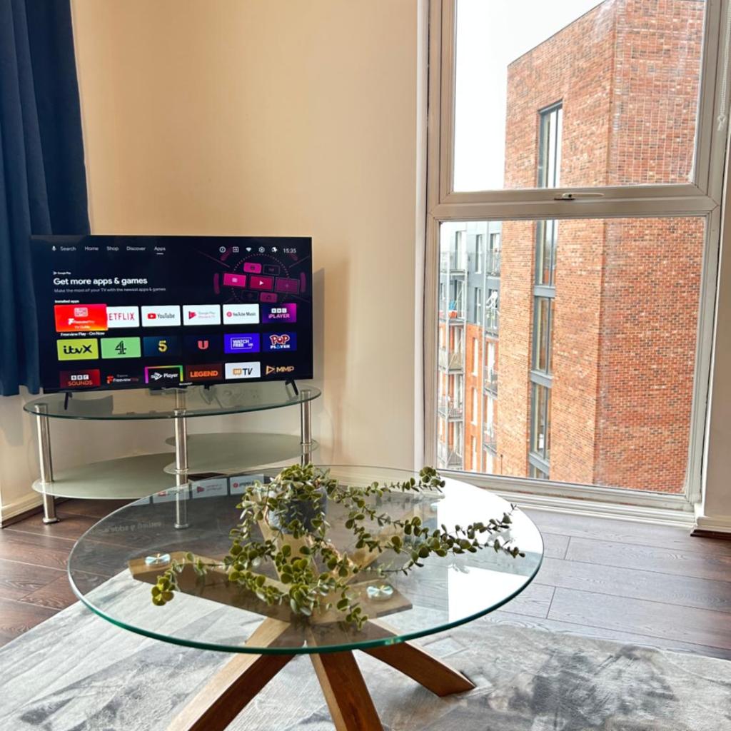 Photograph of Comfortable 2-Bedroom Flat close Etihad and Coop Live