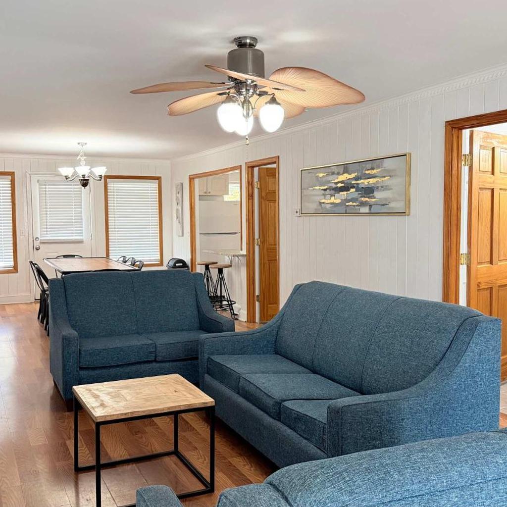 Photograph of Bright cheerful duplex with a pool A
