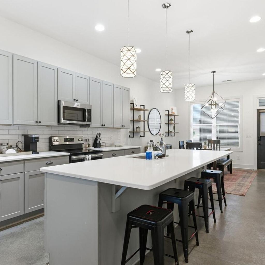 Photograph of Modern 3BR with Rooftop - 10 Min to Broadway